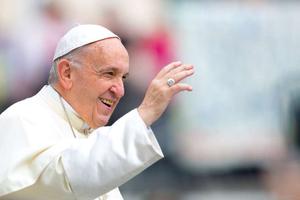 Pope Francis greets the faithful at the general audience May 23. 