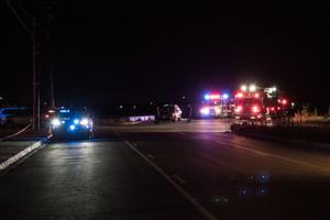 Police officers investigate the scene where a gunman was shot and killed at Cinergy Odessa movie theater Aug. 31 in Odessa, Texas. Officials say the unidentified suspect killed at least seven people and injured 21 in Odessa and nearby Midland. 