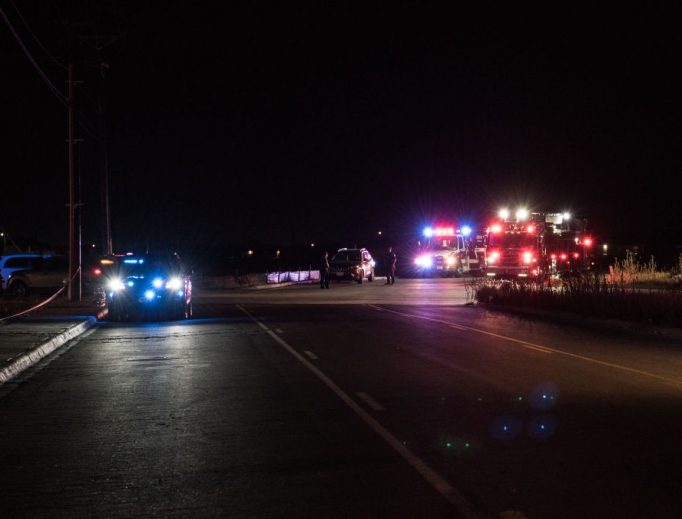 Police officers investigate the scene where a gunman was shot and killed at Cinergy Odessa movie theater Aug. 31 in Odessa, Texas. Officials say the unidentified suspect killed at least seven people and injured 21 in Odessa and nearby Midland. 