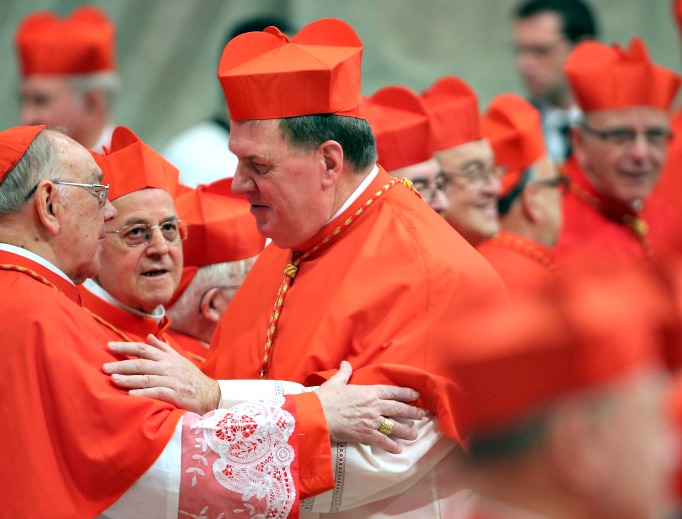 Cardinal Joseph William Tobin, archbishop of Newark, New Jersey, receives congratulations from cardinals during the ordinary public consistory celebrated by Pope Francis at St. Peter's Basilica on Nov. 19 at the Vatican.