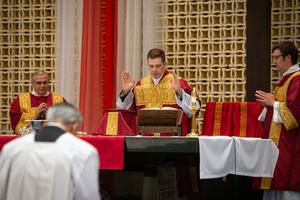 Above, Father Paul Hedman celebrates his first Mass on May 31.