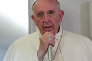 Pope Francis aboard the papal flight from Mexico to Rome on Feb. 17, 2016. 
