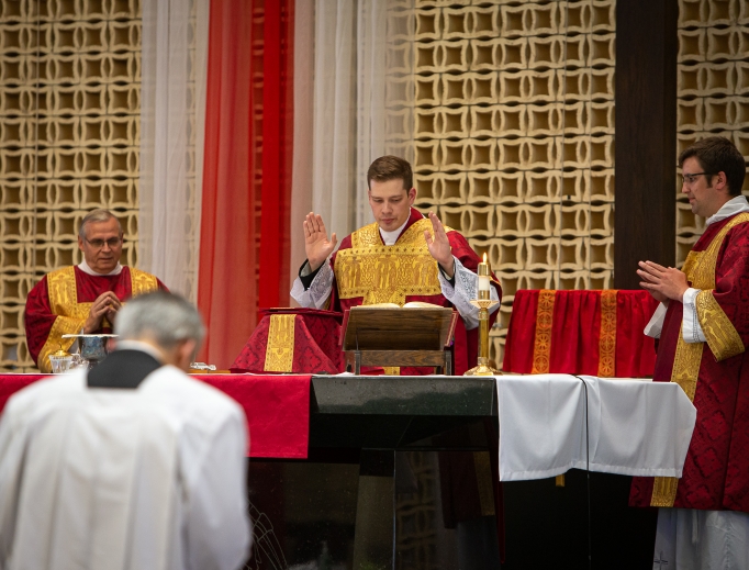 Above, Father Paul Hedman celebrates his first Mass on May 31.