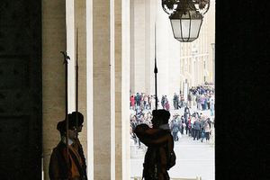 Swiss Guard on duty at the Bronze Door of the Apostolic Palace.