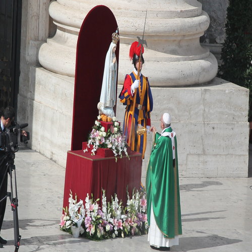 Pope Francis with the statue of Our Lady of Fatima in St. Peter's Square on Oct. 13, 2013.