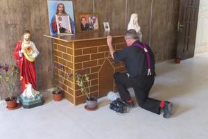Father Benedict Kiely prays at the tomb in Karamlesh of Chaldean Father Ragheed Ganni, who was martyted in 2007; below, he meets with Chaldean Archbishop Bashar Warda of Erbil and  Yazidi spiritual leader Baba Sheikh (c) and Qaraqosh Syriac Catholic native Yohanna Towaya (l).


