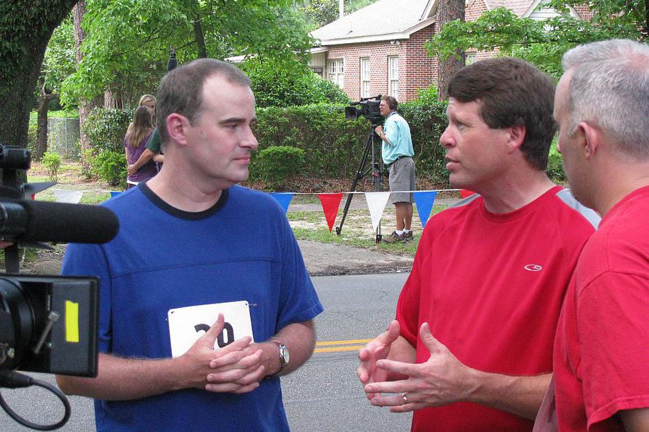 Jim Bob Duggar (middle) talks with "Courageous" filmmakers, actor and director Alex Kendrick (left) and his brother, writer and producer Stephen Kendrick. (Photo by Tim Drake)
