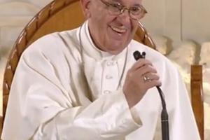 Pope Francis smiles at he begins his address at St. Patrick Parish’s Charitable Center in Washington, D.C.