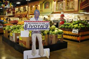 IMPORTANT VOTING BLOC. A sign in Spanish that says, ‘Don't Lose Your Voice, Vote!’ is displayed near a polling place in a Cardenas supermarket in Las Vegas in June. In the battleground state of Nevada, some 17% of eligible voters are Hispanics. 