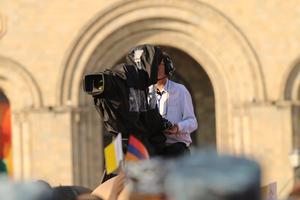 A cameraman filming events during Pope Francis' visit to Armenia, June 25, 2016. 