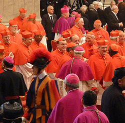 Cardinals greet each other after the consistory Nov. 24, 2012, in St. Peter's Basilica.