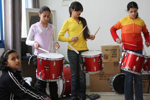 Drumming for the Pope: Palestinian girl scouts practice in preparation for Benedict's visit to the Aida refugee camp.