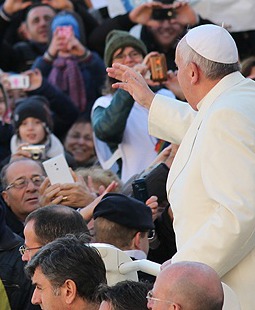 Pope Francis greets pilgrims in St. Peter’s Square.
