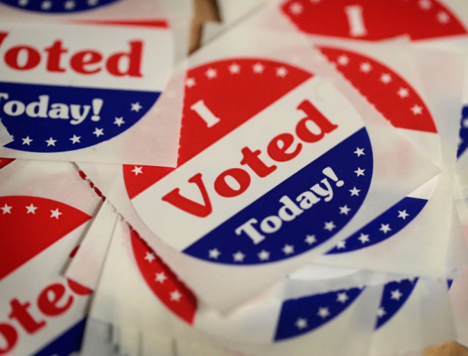 Stickers are made available to voters who cast a ballot in the midterm elections at the Polk County Election Office Oct. 8 in Des Moines, Iowa. Oct. 8 was the first day of early voting in the state. 