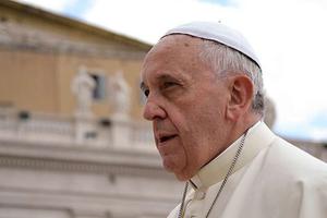 Pope Francis greets pilgrims in St. Peter’s Square during the Wednesday general audience on May 28, 2014. 