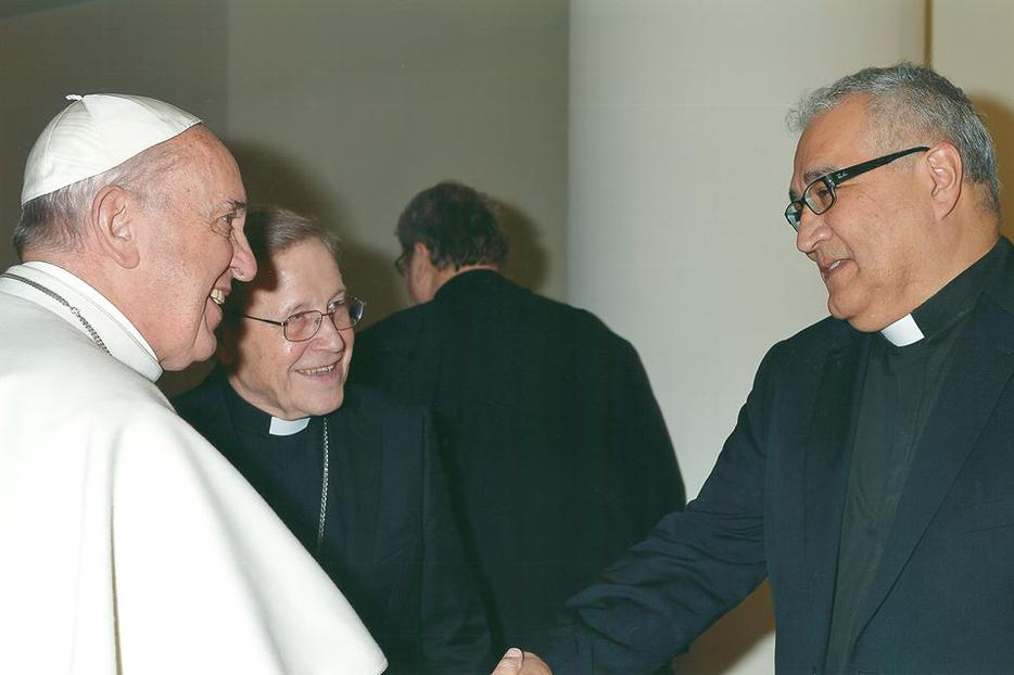 Pope Francis with the Walter Cardinal Kasper greeting Fr. Gil Martinez C.S.P.