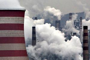 Smoke billows from smokestacks and a coal-fired generator at a steel factory on Nov. 19 in the industrial province of Hebei, China. At an upcoming conference in Paris, the governments of 196 countries will meet to set targets on reducing carbon emissions in an attempt to forge a new global agreement on climate change.
