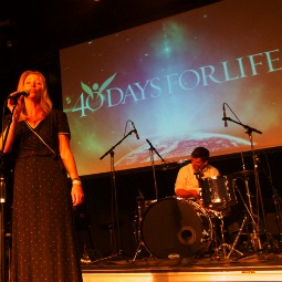 Marie Bellet, a mother of nine who resides in Nashville, who regularly prays in front of abortion clinics, performs as part of the festival. 