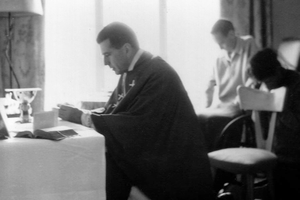 Manuel Lozano Garrido (seen in the background) assists at Mass in his apartment in November 1971.
