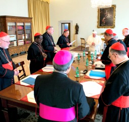 Pope Francis meets with his so-called 'Group of Eight' cardinals during their first meeting at the Vatican Oct. 1.
