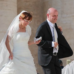 A newly married couple at the Vatican waits to be blessed by Pope Francis on Oct. 16, 2013. 