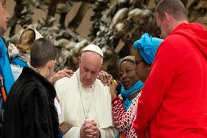 Pope Francis meets with pilgrims during a jubilee audience in the Paul VI Hall on Nov. 11.


