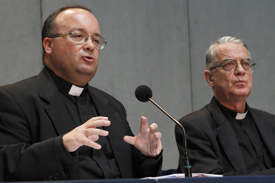 Msgr. Charles J. Scicluna, the Vatican's "Attorney General" and Vatican spokesman Fr. Federico Lombardi at a press conference last year on the issue of clerical sex abuse.