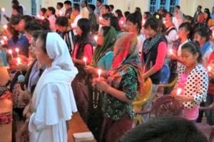 Faithful in India’s Miao Diocese pray in a candlelight vigil for persecuted Christians in the Middle East on March 1.