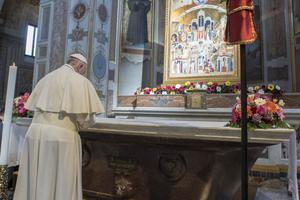 Pope Francis prays at the Church of San Bartolomeo in Rome on April 22.