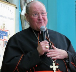 Cardinal Timothy Dolan speaks March 13 at the North American College in Rome.