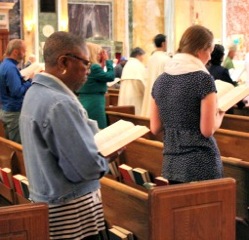 A hymn is sung at the Sept. 16 Mass for consolation and healing at Washington's St. Matthew's Cathedral.