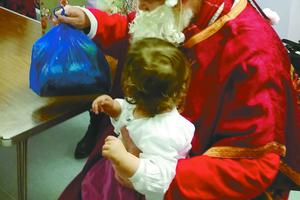 A Christmas party for babies celebrates the dignity of human life and the help their mothers have received from Good Counsel Network. 