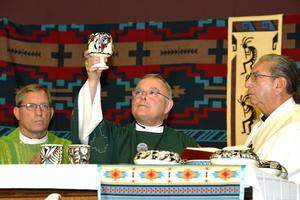 Above, Archbishop Charles Chaput of Philadelphia celebrates Mass at the 2013 Tekakwitha Conference gathering. Below, Murray O'Coin, a Mohawk of the Bear Clan, and lay administrator of the Keristos Ne Korah:Kowah [Christ the King] ordinariate community in Tyendinaga. 
