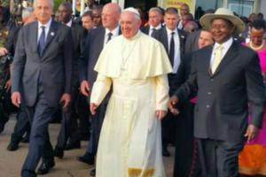 Pope Francis arrives in Uganda.
