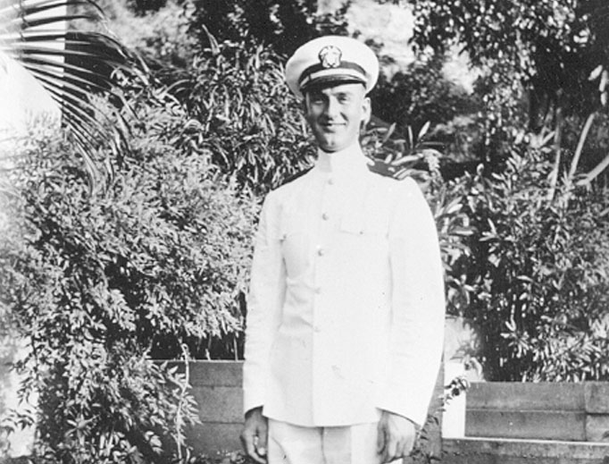 HERO-PRIEST. Father Aloysius Schmitt was remembered at an Oct. 8 funeral Mass, below; Chaplain Schmitt (shown in uniform above and below) was a true hero that fateful day. Also shown: display case with his chalice and other effects.
