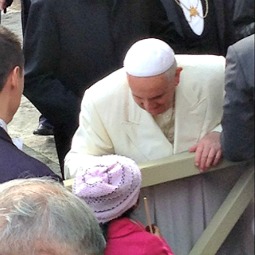 Jersey Vargas (bottom, center) meets Pope Francis after the general audience at St. Peter's Square on March 26, 2014.
