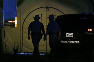 Law enforcement officials work at scene of a shooting at the First Baptist Church of Sutherland Springs, Texas, Nov 5.