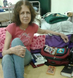 Julie Rogers, evacuated from her home, stays at a Red Cross shelter in Prescott, Ariz.