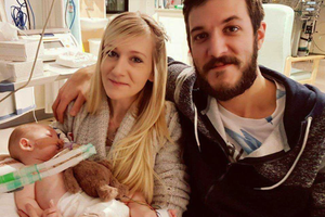 Charlie Gard with his parents Connie Yates and Chris Gard.