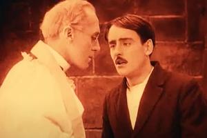 Father Fathley (A.W. McClure) hears the confession of The Boy (Robert Harron) in D.W. Griffith’s 1916 movie Intolerance.