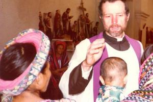 Father Stanley Rother blesses a baby and celebrates Mass in Guatemala. 