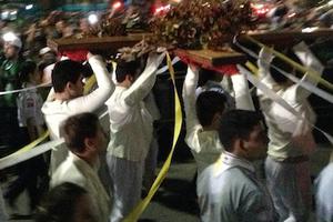 Representatives from every continent carry WYD cross, given to the youth of the world by Pope John Paul II in 1984, along the Way of the Cross at Copacabana beach July 26.