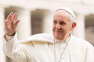 Pope Francis waves to pilgrims during his March 28 general audience in St. Peter's Square. 