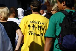 HOPE NOT HATE. A Prop 8 supporter wears a "Yes on 8" T-shirt as he arrives at a football stadium in San Diego, California November 1, 2008. Thousands of people gathered to pray for the passage of Proposition 8.