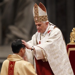 NEW BISHOP. Pope Benedict XVI lays his hands on Archbishop Savio Hon Tai-Fai, who is from Hong Kong, during an ordination Mass in St. Peter’s Basilica at the Vatican Feb. 5. The Pope ordained to the espicopacy two Vatican diplomats and three secretaries of Vatican congregations. 
