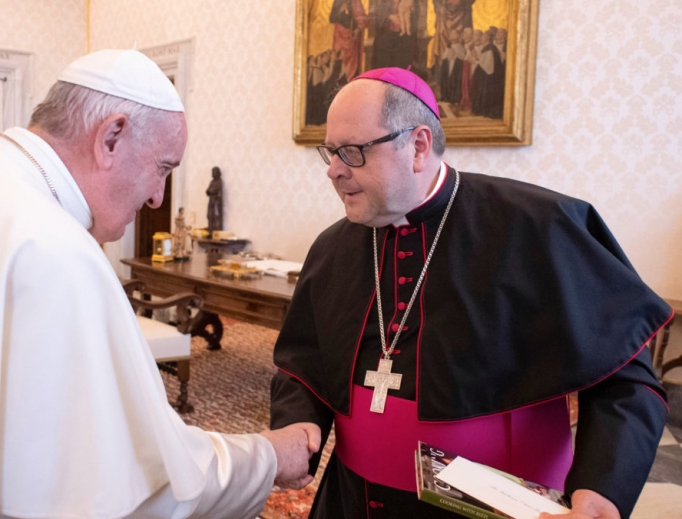 Pope Francis greets Bishop Edward Malesic at the Vatican. 