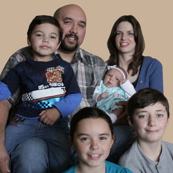 Heidi and Dan Sierras with their children, Logan, 3, baby Eleanor, Kayla, 8, and Ethan, 11.