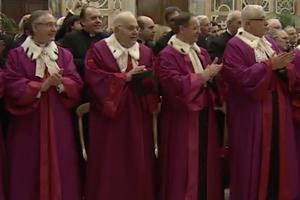 Members of the Roma Rota greet Pope Francis Jan. 23 at the Vatican.