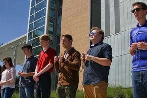 Members of the Society of St. Peter Damian pray the Rosary Sept. 27.
