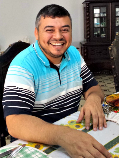 Father José Almy ministers to the people in the Brazilian favela of Morro Babilônia.